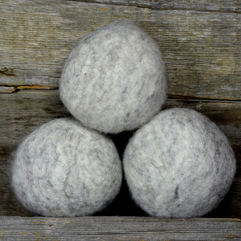 
            
                Load image into Gallery viewer, light grey dryer balls made in calgary
            
        